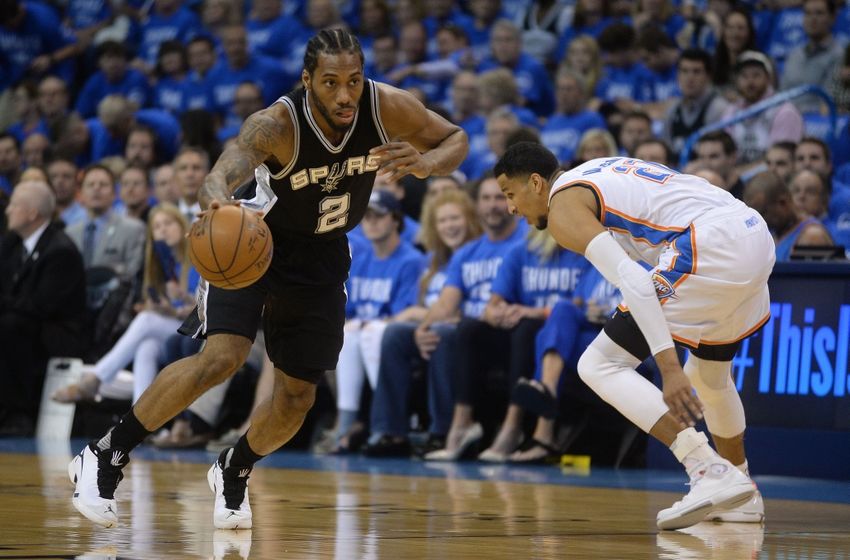 May 12, 2016; Oklahoma City, OK, USA; San Antonio Spurs forward Kawhi Leonard (2) brings the ball up the court against Oklahoma City Thunder guard Andre Roberson (21) during the first quarter in game six of the second round of the NBA Playoffs at Chesapeake Energy Arena. Mandatory Credit: Mark D. Smith-USA TODAY Sports
