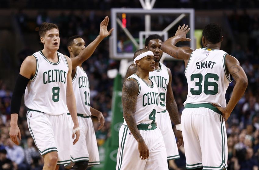 Feb 25, 2015; Boston, MA, USA; Boston Celtics forward Jonas Jerebko (8), guard Evan Turner (11), guard Isaiah Thomas (4), forward Jae Crowder (99) and guard Marcus Smart (36) celebrate against the New York Knicks during the second half at TD Garden. Mandatory Credit: Mark L. Baer-USA TODAY Sports