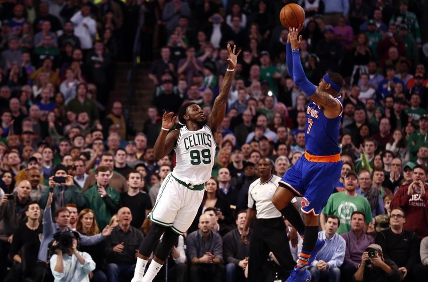 New York Knicks forward Carmelo Anthony (7) hits a go-ahead shot against Boston Celtics forward Jae Crowder (99) during the closing seconds of the second half at TD Garden. The Celtics would defeat the Knicks 105-104. Mandatory Credit: Mark L. Baer-USA TODAY Sports