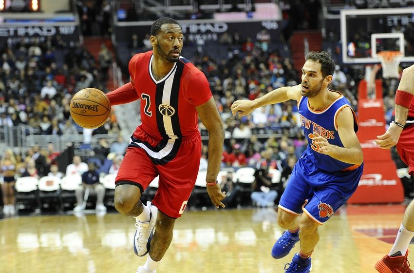 Mar 19, 2016; Washington, DC, USA; Washington Wizards guard John Wall (2) dribbles as New York Knicks guard Jose Calderon (3) defends during the second half at Verizon Center. The Washington Wizards won 99 - 89. Mandatory Credit: Brad Mills-USA TODAY Sports