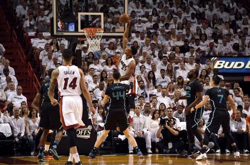 May 1, 2016; Miami, FL, USA; Miami Heat center Hassan Whiteside (21) dunks the ball as Charlotte Hornets center Frank Kaminsky III (44) looks on during the first half in game seven of the first round of the NBA Playoffs at American Airlines Arena. Mandatory Credit: Steve Mitchell-USA TODAY Sports