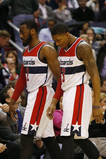 Jan 16, 2015; Washington, DC, USA; Washington Wizards guard John Wall (2) and Wizards guard Bradley Beal (3) walk off the court during a stoppage in play against the Brooklyn Nets in the second quarter at Verizon Center. The Nets won 102-80. Mandatory Credit: Geoff Burke-USA TODAY Sports