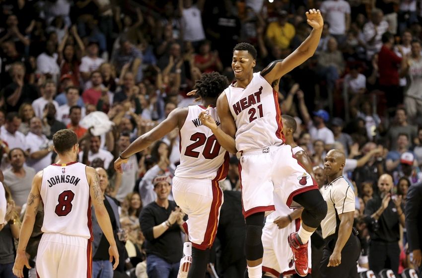 Nov 1, 2015; Miami, FL, USA; Miami Heat center Hassan Whiteside (right) celebrates with Miami Heat forward Justise Winslow (left) after Winslow made a three point basket during the second half at American Airlines Arena. The Heat won 109-89. Mandatory Credit: Steve Mitchell-USA TODAY Sports