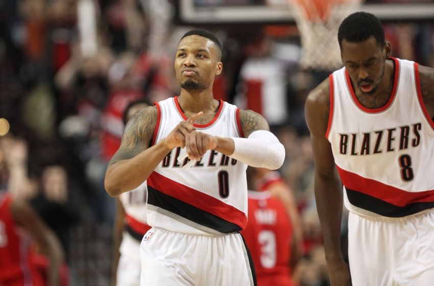 Nov 20, 2015; Portland, OR, USA; Portland Trail Blazers guard Damian Lillard (0) reacts after scoring a three point shot against the Los Angeles Clippers at Moda Center at the Rose Quarter. Mandatory Credit: Jaime Valdez-USA TODAY Sports