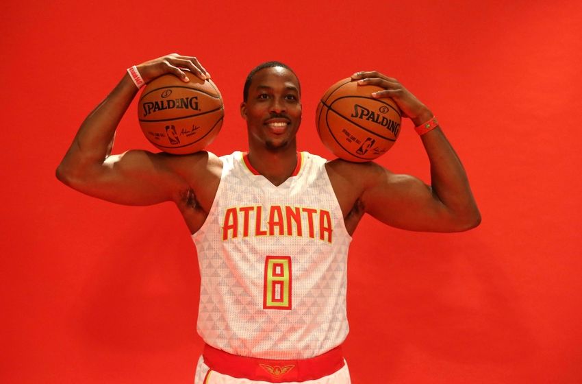 Sep 26, 2016; Atlanta, GA, USA; Atlanta Hawks center Dwight Howard (8) poses for photographs during Atlanta Hawks media day at The W Hotel. Mandatory Credit: Jason Getz-USA TODAY Sports