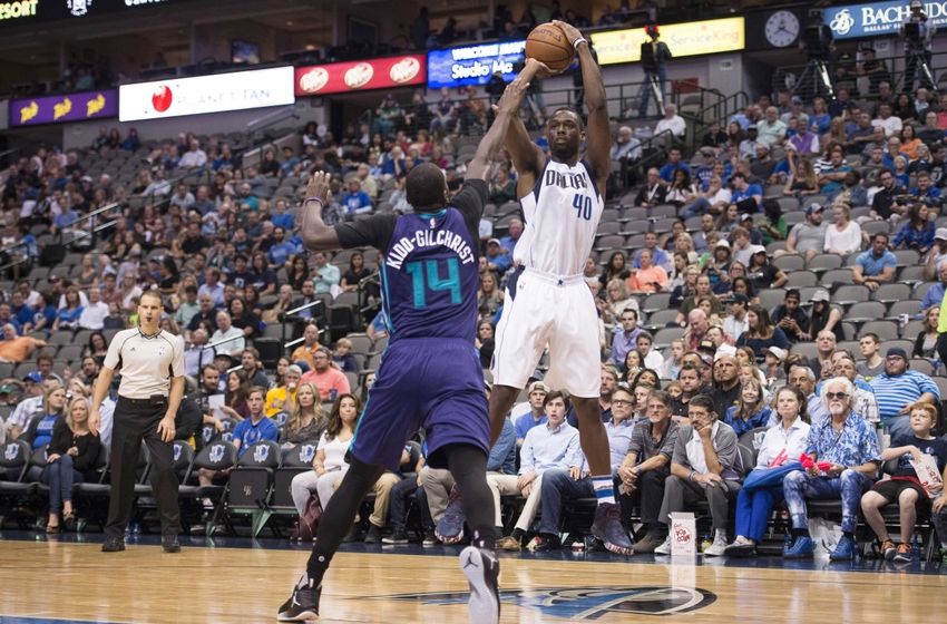 Oct 3, 2016; Dallas, TX, USA; Dallas Mavericks forward Harrison Barnes (40) shoots over Charlotte Hornets forward Michael Kidd-Gilchrist (14) during the first half at the American Airlines Center. Mandatory Credit: Jerome Miron-USA TODAY Sports