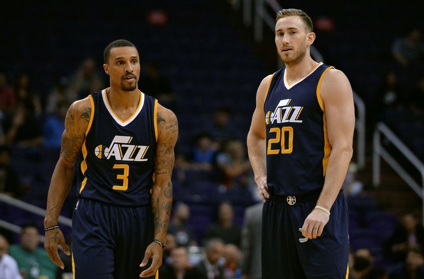 Oct 5, 2016; Phoenix, AZ, USA; Utah Jazz guard George Hill (3) and forward Gordon Hayward (20) talk mid court during the first half of the game against the Phoenix Suns at Talking Stick Resort Arena. The Utah Jazz defeated the Phoenix Suns 104-99. Mandatory Credit: Jennifer Stewart-USA TODAY Sports