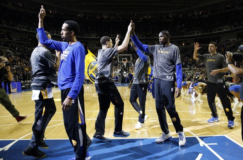 Oct 6, 2016; San Jose, CA, USA; Golden State Warriors forward Kevin Durant (35) gives a high five to guard Klay Thompson (11) before the start of the game against the Sacramento Kings at the SAP Center. Mandatory Credit: Cary Edmondson-USA TODAY Sports