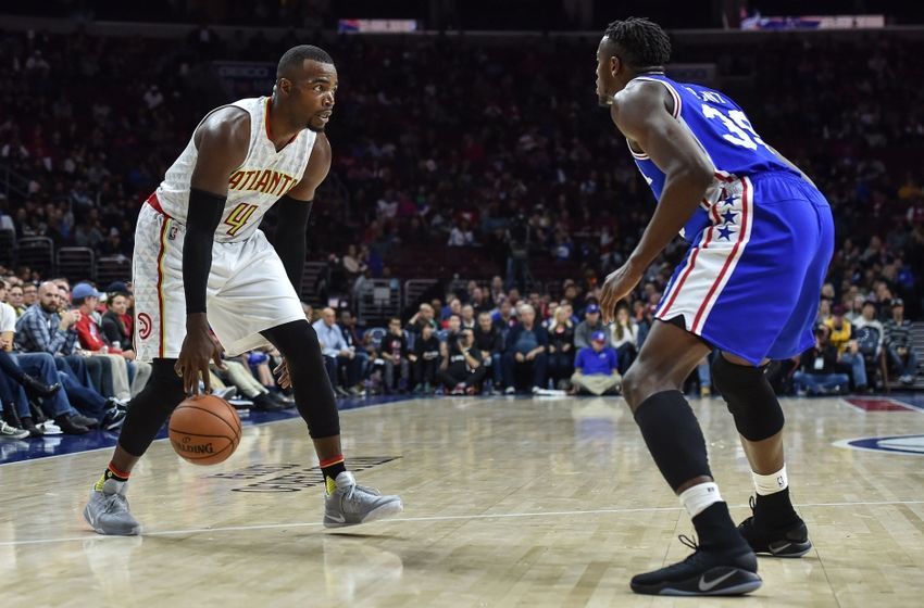 Oct 29, 2016; Philadelphia, PA, USA; Atlanta Hawks forward Paul Millsap (4) dribbles as Philadelphia 76ers forward Jerami Grant (39) defends during the fourth quarter of the game at the Wells Fargo Center. The Atlanta Hawks won 104-72. Mandatory Credit: John Geliebter-USA TODAY Sports