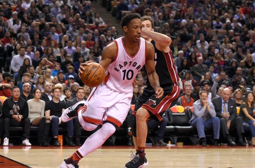 Nov 4, 2016; Toronto, Ontario, CAN; Toronto Raptors guard DeMar DeRozan (10) drives for a basket past Miami Heat guard Goran Dragic (7) in the second half at Air Canada Centre. DeRozan scored 34 points in a 96-87 win for Toronto. Mandatory Credit: Dan Hamilton-USA TODAY Sports