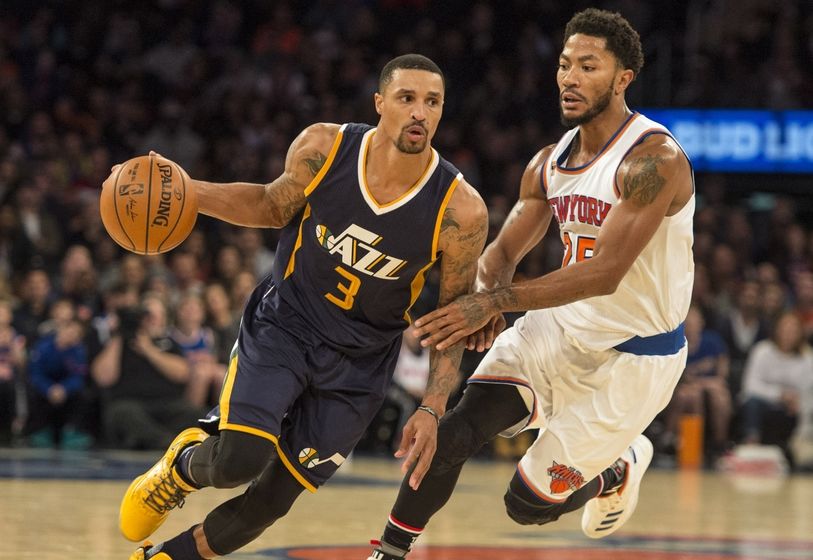 Nov 6, 2016; New York, NY, USA; Utah Jazz point guard George Hill (3) dribbles the ball against New York Knicks point guard Derrick Rose (25) during the fourth quarter at Madison Square Garden. Utah won 114-109. Mandatory Credit: Gregory J. Fisher-USA TODAY Sports