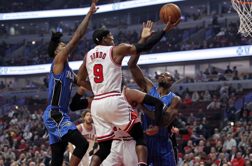 Nov 7, 2016; Chicago, IL, USA; Chicago Bulls guard Rajon Rondo (9) goes up for a layup while defended by Orlando Magic guard Elfrid Payton (4) during the first quarter of the game at United Center. Mandatory Credit: Caylor Arnold-USA TODAY Sports
