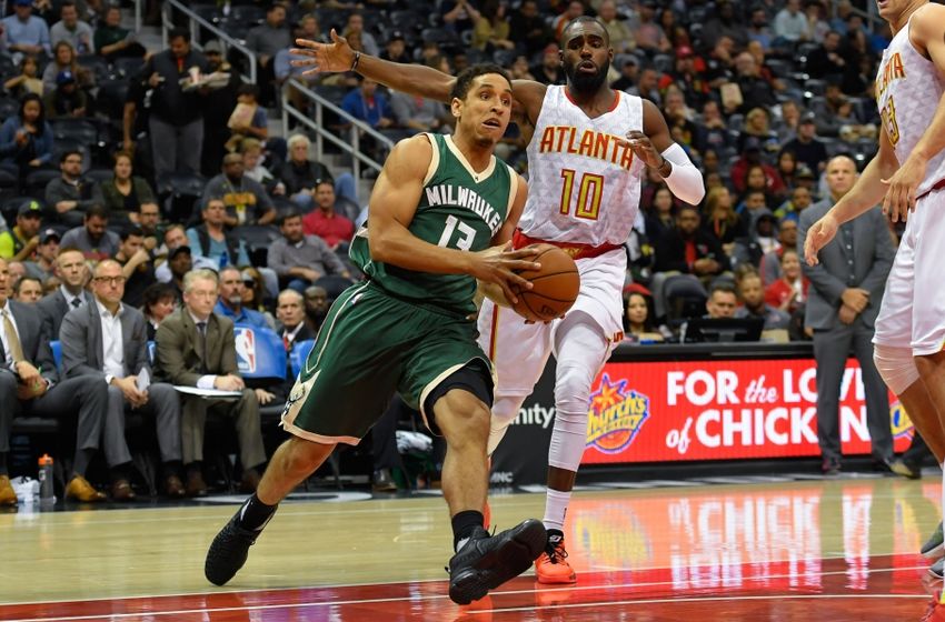 Nov 16, 2016; Atlanta, GA, USA; Milwaukee Bucks guard Malcolm Brogdon (13) dribbles the ball past Atlanta Hawks guard Tim Hardaway Jr. (10) during the first half at Philips Arena. Mandatory Credit: Dale Zanine-USA TODAY Sports