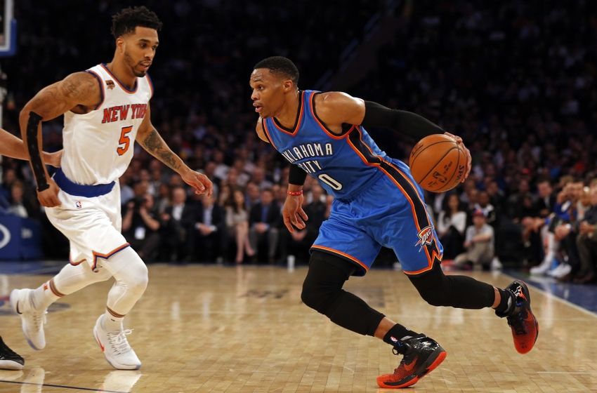 Nov 28, 2016; New York, NY, USA; Oklahoma City Thunder guard Russell Westbrook (0) drives to the basket past New York Knicks guard Courtney Lee (5) during the first half at Madison Square Garden. Mandatory Credit: Adam Hunger-USA TODAY Sports