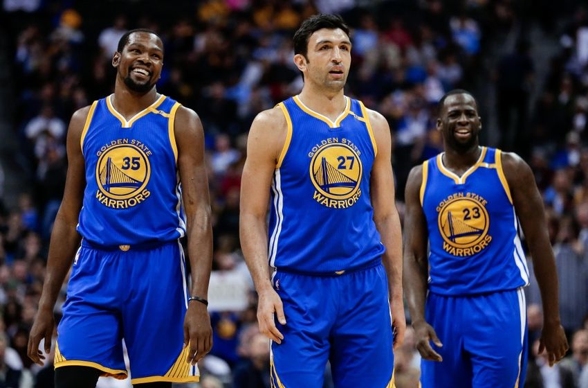 Nov 10, 2016; Denver, CO, USA; Golden State Warriors center Zaza Pachulia (27) and forward Kevin Durant (35) and forward Draymond Green (23) in the third quarter against the Denver Nuggets at the Pepsi Center. Mandatory Credit: Isaiah J. Downing-USA TODAY Sports