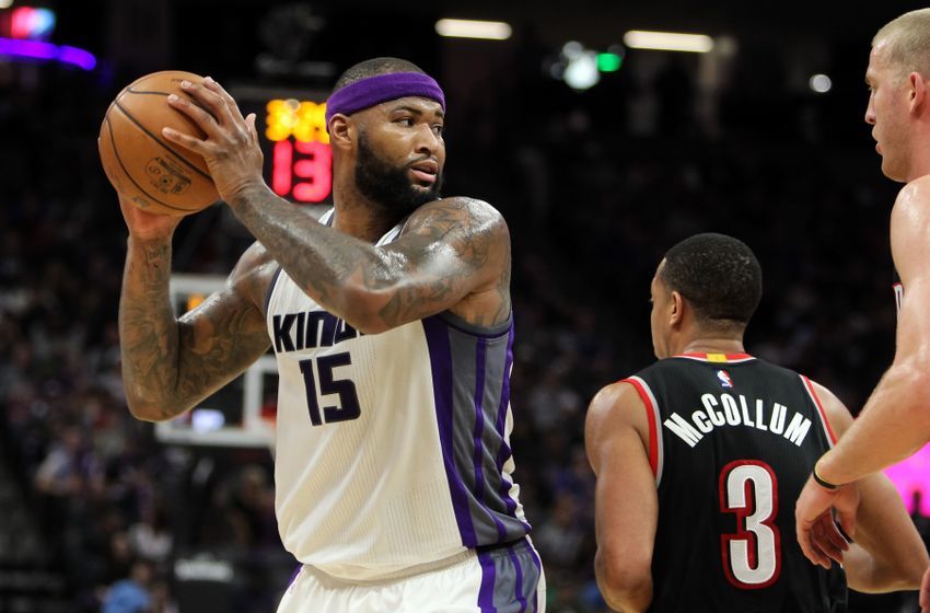 Dec 20, 2016; Sacramento, CA, USA; Sacramento Kings forward DeMarcus Cousins (15) looks to pass against Portland Trail Blazers center Mason Plumlee (24) during the third quarter at Golden 1 Center. The Kings defeated the Blazers 126-121. Mandatory Credit: Sergio Estrada-USA TODAY Sports