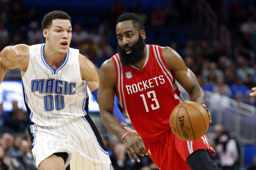 Jan 6, 2017; Orlando, FL, USA; Houston Rockets guard James Harden (13) drives to the basket as Orlando Magic forward Aaron Gordon (00) defends during the first quarter at Amway Center. Mandatory Credit: Kim Klement-USA TODAY Sports