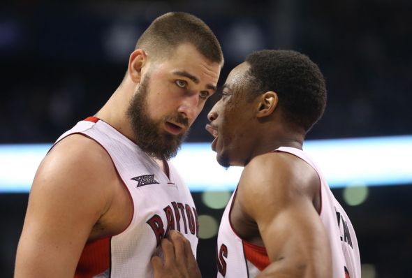 Jan 18, 2015; Toronto, Ontario, CAN; Toronto Raptors guard DeMar DeRozan (10) talks to center Jonas Valanciunas (17) against the New Orleans Pelicans at Air Canada Centre. The Pelicans beat the Raptors 95-93. Mandatory Credit: Tom Szczerbowski-USA TODAY Sports