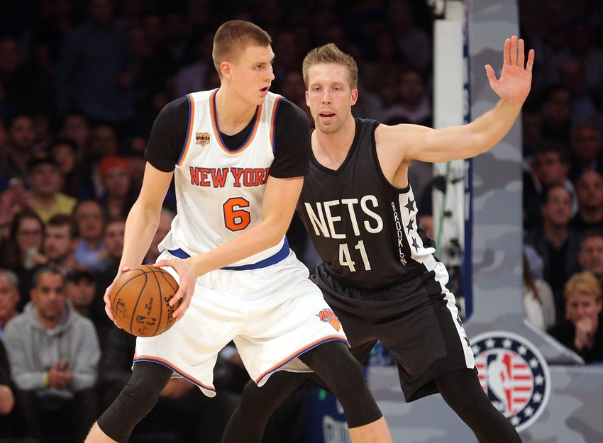 Nov 9, 2016; New York, NY, USA; New York Knicks power forward Kristaps Porzingis (6) controls the ball against Brooklyn Nets center Justin Hamilton (41) during the second quarter at Madison Square Garden. Mandatory Credit: Brad Penner-USA TODAY Sports