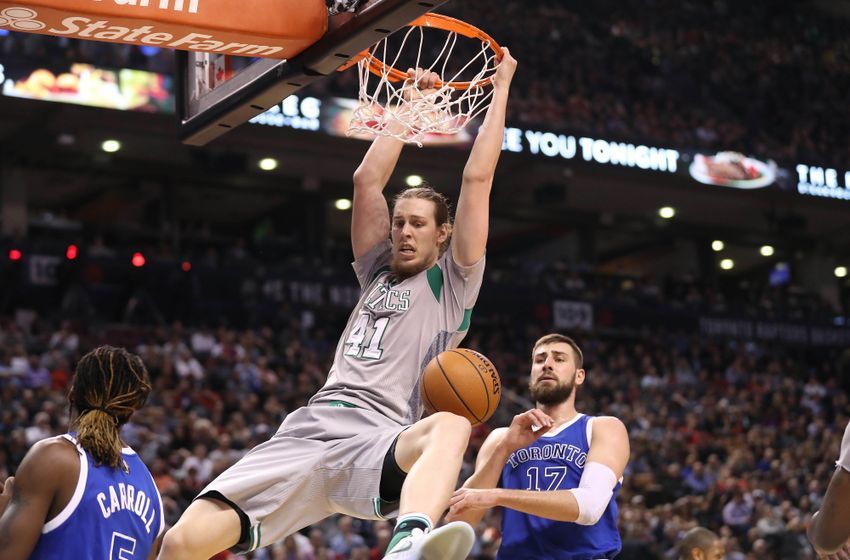 Jan 10, 2017; Toronto, Ontario, CAN; Boston Celtics forward Kelly Olynyk (41) dunks the ball against the Toronto Raptors at Air Canada Centre. The Raptors won 114-106. Mandatory Credit: Tom Szczerbowski-USA TODAY Sports