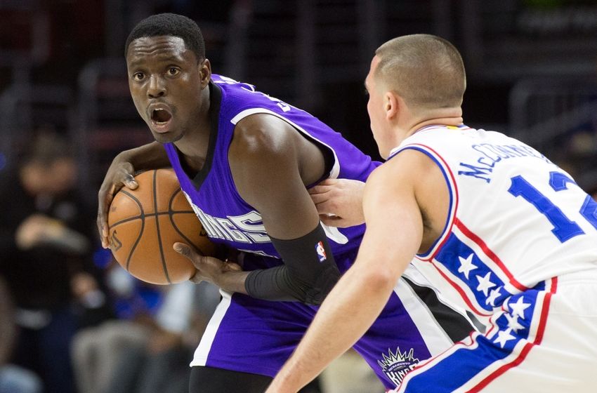 Feb 10, 2016; Philadelphia, PA, USA; Sacramento Kings guard Darren Collison (7) looks for an opening past Philadelphia 76ers guard T.J. McConnell (12) during the second quarter at Wells Fargo Center. Mandatory Credit: Bill Streicher-USA TODAY Sports