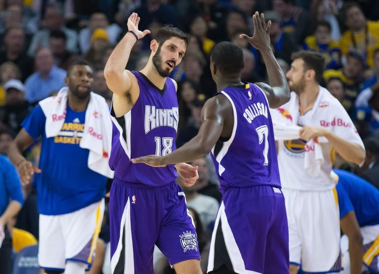 Dec 28, 2015; Oakland, CA, USA; Sacramento Kings forward Omri Casspi (18) high fives guard Darren Collison (7) against the Golden State Warriors during the second quarter at Oracle Arena. Mandatory Credit: Kelley L Cox-USA TODAY Sports