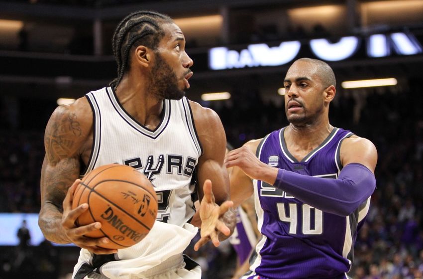Oct 27, 2016; Sacramento, CA, USA; San Antonio Spurs forward Kawhi Leonard (2) controls the ball Sacramento Kings guard Arron Afflalo (40) during the fourth quarter at Golden 1 Center. The Spurs won the game 102-94. Mandatory Credit: Sergio Estrada-USA TODAY Sports