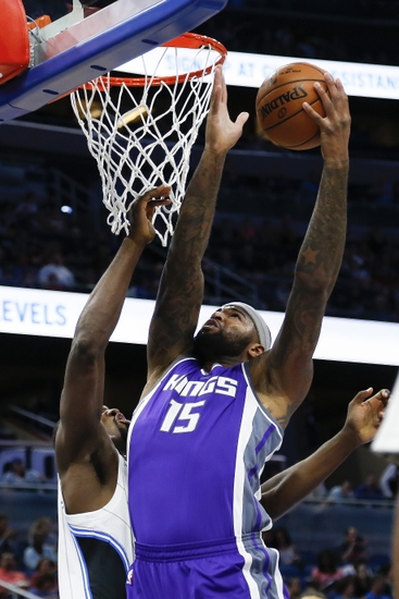 Nov 3, 2016; Orlando, FL, USA; Sacramento Kings center DeMarcus Cousins (15) goes up for a shot in the first quarter as Orlando Magic forward Serge Ibaka (7) defends at Amway Center. Mandatory Credit: Logan Bowles-USA TODAY Sports