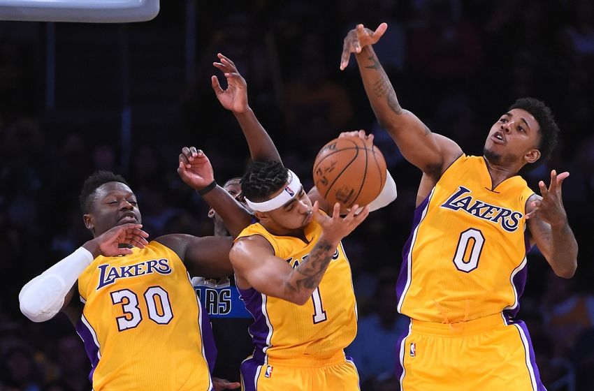 Nov 8, 2016; Los Angeles, CA, USA; Los Angeles Lakers guard D'Angelo Russell (1), forward Julius Randle (30) and guard Nick Young (0) go for a rebound in the second half of the game against the Dallas Mavericks at Staples Center. Mavericks won 109-97. Mandatory Credit: Jayne Kamin-Oncea-USA TODAY Sports