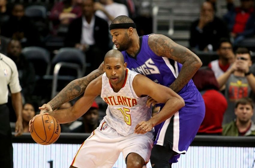 Nov 18, 2015; Atlanta, GA, USA; Atlanta Hawks center Al Horford (15) drives against Sacramento Kings forward DeMarcus Cousins (15) in the first quarter of their game at Philips Arena. Mandatory Credit: Jason Getz-USA TODAY Sports