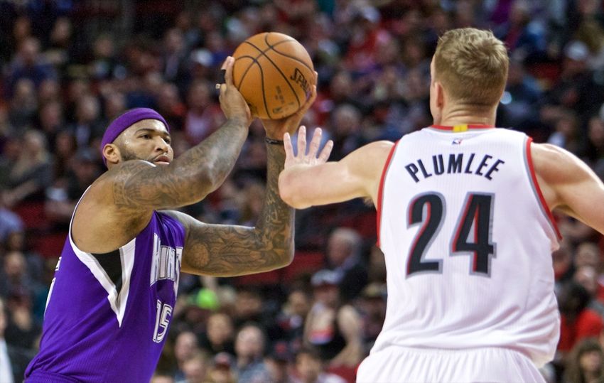 Jan 26, 2016; Portland, OR, USA; Sacramento Kings center DeMarcus Cousins (15) shoots over Portland Trail Blazers center Mason Plumlee (24) during the first quarter at the Moda Center. Mandatory Credit: Craig Mitchelldyer-USA TODAY Sports
