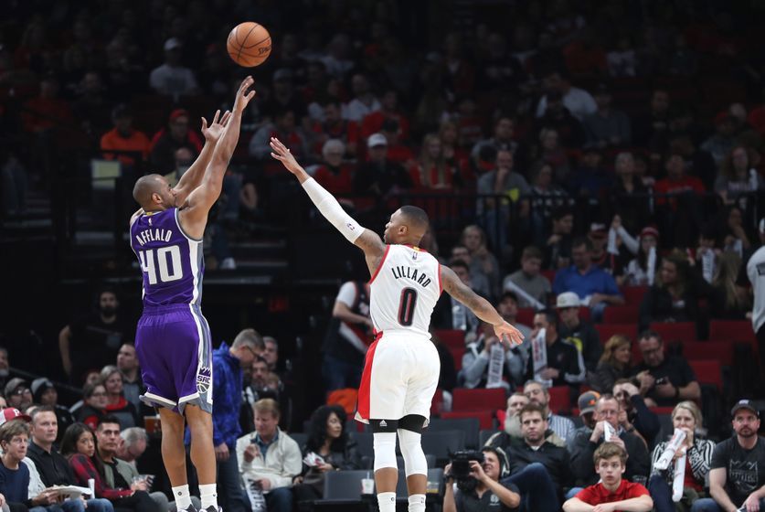 Nov 11, 2016; Portland, OR, USA; Sacramento Kings guard Arron Afflalo (40) shoots over Portland Trail Blazers guard Damian Lillard (0) in the second half at Moda Center at the Rose Quarter. Mandatory Credit: Jaime Valdez-USA TODAY Sports