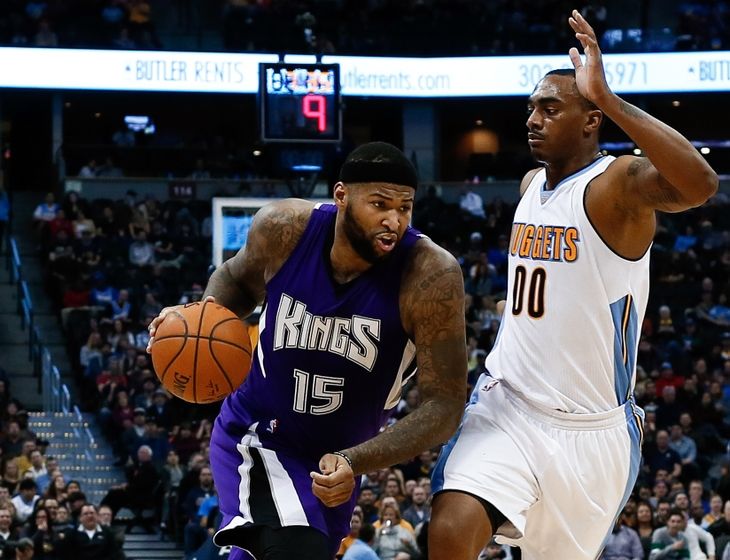 Feb 23, 2016; Denver, CO, USA; Sacramento Kings center DeMarcus Cousins (15) drives to the net against Denver Nuggets forward Darrell Arthur (00) in the fourth quarter at Pepsi Center. The Kings defeated the Nuggets 114-110. Mandatory Credit: Isaiah J. Downing-USA TODAY Sports