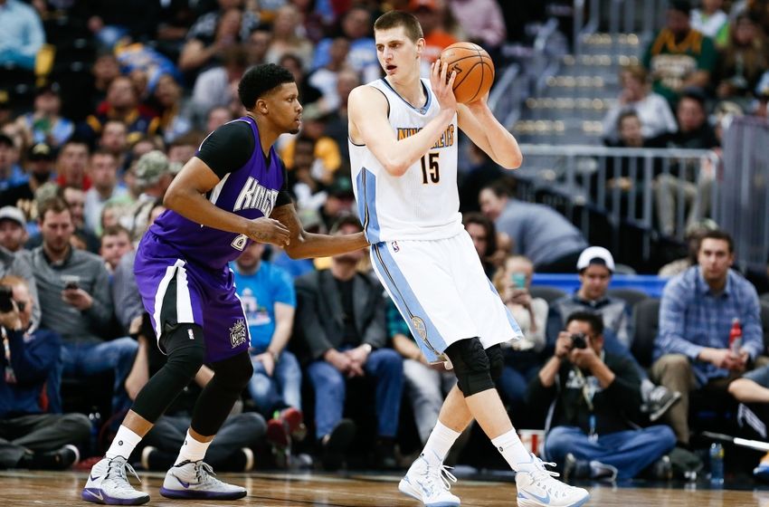 Apr 2, 2016; Denver, CO, USA; Sacramento Kings forward Rudy Gay (8) guards Denver Nuggets center Nikola Jokic (15) in the third quarter at the Pepsi Center. The Kings defeated the Nuggets 115-106. Mandatory Credit: Isaiah J. Downing-USA TODAY Sports