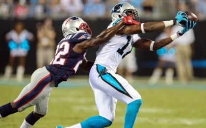 Aug 26, 2016; Charlotte, NC, USA; New England Patriots cornerback Justin Coleman (22) hangs on to Carolina Panthers wide receiver Devin Funchess (17) at Bank of America Stadium. Mandatory Credit: Jim Dedmon-USA TODAY Sports