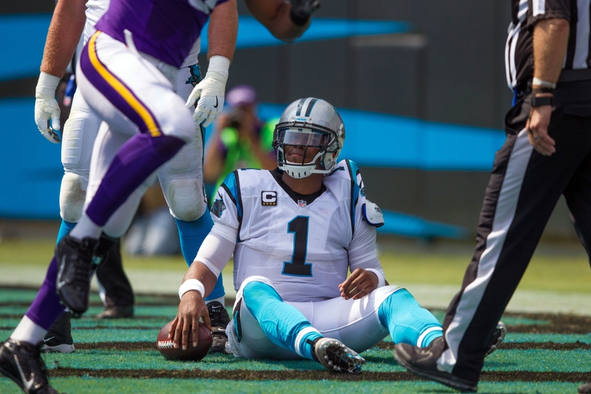 Sep 25, 2016; Charlotte, NC, USA; Carolina Panthers quarterback Cam Newton (1) sits on the ground after being sacked for a safety in the first quarter against the Minnesota Vikings at Bank of America Stadium. Mandatory Credit: Jeremy Brevard-USA TODAY Sports