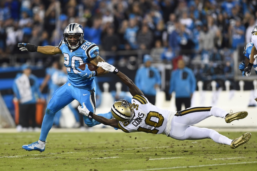Nov 17, 2016; Charlotte, NC, USA; Carolina Panthers strong safety Kurt Coleman (20) returns an interception as New Orleans Saints wide receiver Brandin Cooks (10) defends in the second quarter at Bank of America Stadium. Mandatory Credit: Bob Donnan-USA TODAY Sports