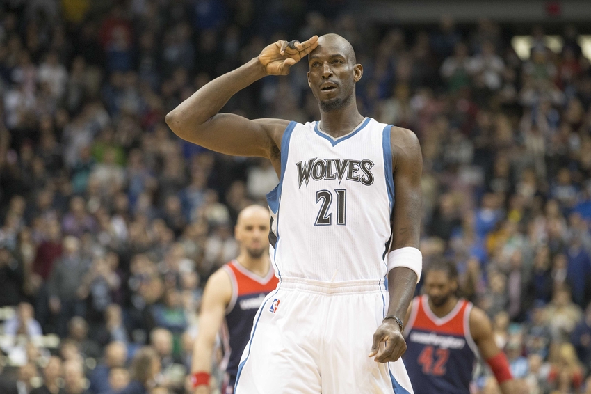 Feb 25, 2015; Minneapolis, MN, USA; Minnesota Timberwolves forward Kevin Garnett (21) salutes the fans during a game against the Washington Wizards at Target Center. Mandatory Credit: Jesse Johnson-USA TODAY Sports