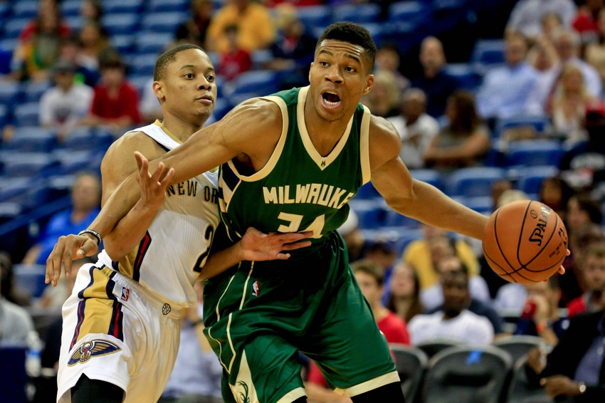 Nov 1, 2016; New Orleans, LA, USA; Milwaukee Bucks forward Giannis Antetokounmpo (34) is defended by New Orleans Pelicans guard Tim Frazier (2) during the first quarter of a game at the Smoothie King Center. Mandatory Credit: Derick E. Hingle-USA TODAY Sports