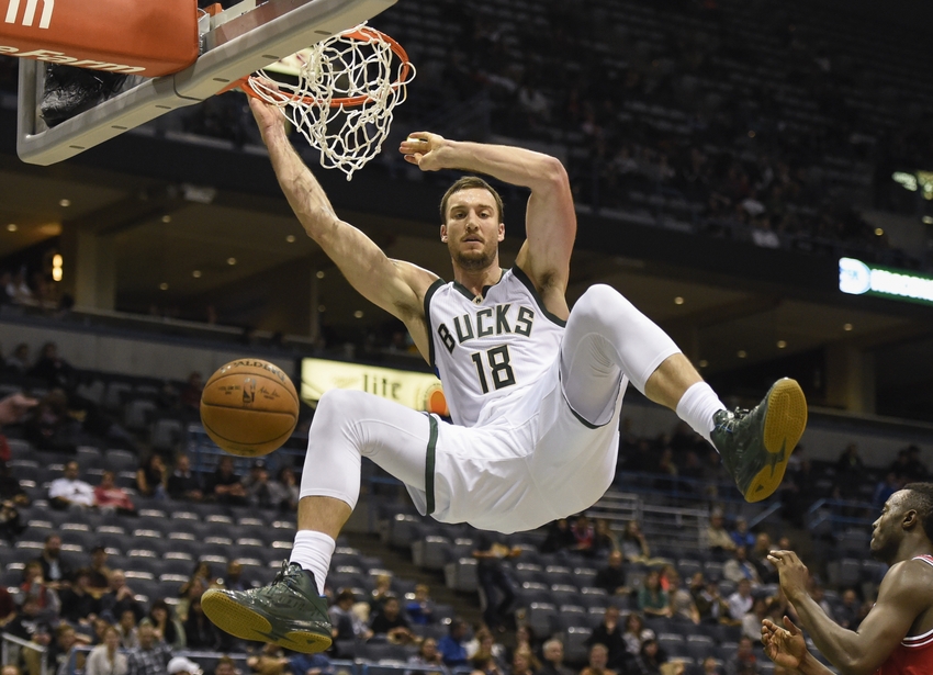 Oct 15, 2016; Milwaukee, WI, USA; Milwaukee Bucks center Miles Plumlee (18) dunks the ball in the third quarter during the game against the Chicago Bulls at BMO Harris Bradley Center. Mandatory Credit: Benny Sieu-USA TODAY Sports