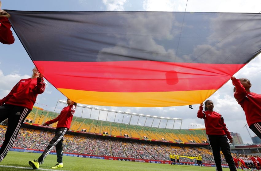 Jul 4, 2015; Edmonton, Alberta, CAN; The flag of Germany is carries off the field before a game between Germany and England in the third place match of the FIFA 2015 Women