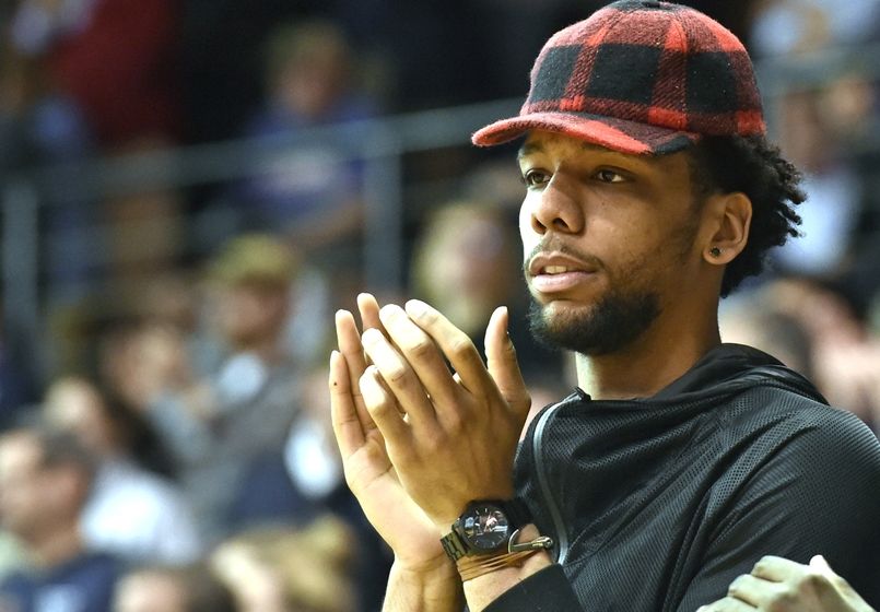 Mar 1, 2016; Villanova, PA, USA; Philadelphia 76ers forward Jahlil Okafor watches game between Villanova Wildcats and DePaul Blue Demons during the second half at The Pavilion. Villanova defeated DePaul, 83-62. Mandatory Credit: Eric Hartline-USA TODAY Sports