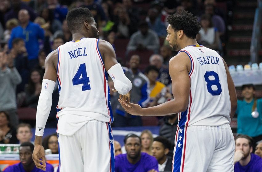 Dec 1, 2015; Philadelphia, PA, USA; Philadelphia 76ers forward Nerlens Noel (4) and center Jahlil Okafor (8) celebrate a score against the Los Angeles Lakers during the second half at Wells Fargo Center. The 76ers won 103-91. Mandatory Credit: Bill Streicher-USA TODAY Sports