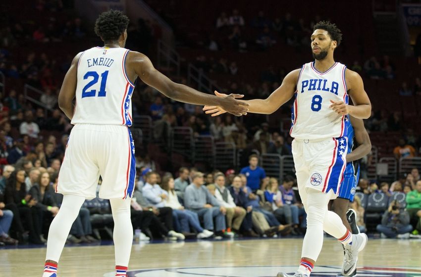 Dec 2, 2016; Philadelphia, PA, USA; Philadelphia 76ers center Joel Embiid (21) and center Jahlil Okafor (8) congratulate each other after a score against the Orlando Magic during the second quarter at Wells Fargo Center. Mandatory Credit: Bill Streicher-USA TODAY Sports