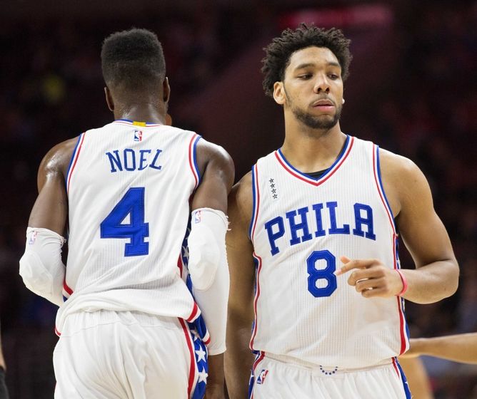 Jan 9, 2016; Philadelphia, PA, USA; Philadelphia 76ers center Jahlil Okafor (8) an forward Nerlens Noel (4) in a game against the Toronto Raptors at Wells Fargo Center. The Raptors won 108-95. Mandatory Credit: Bill Streicher-USA TODAY Sports