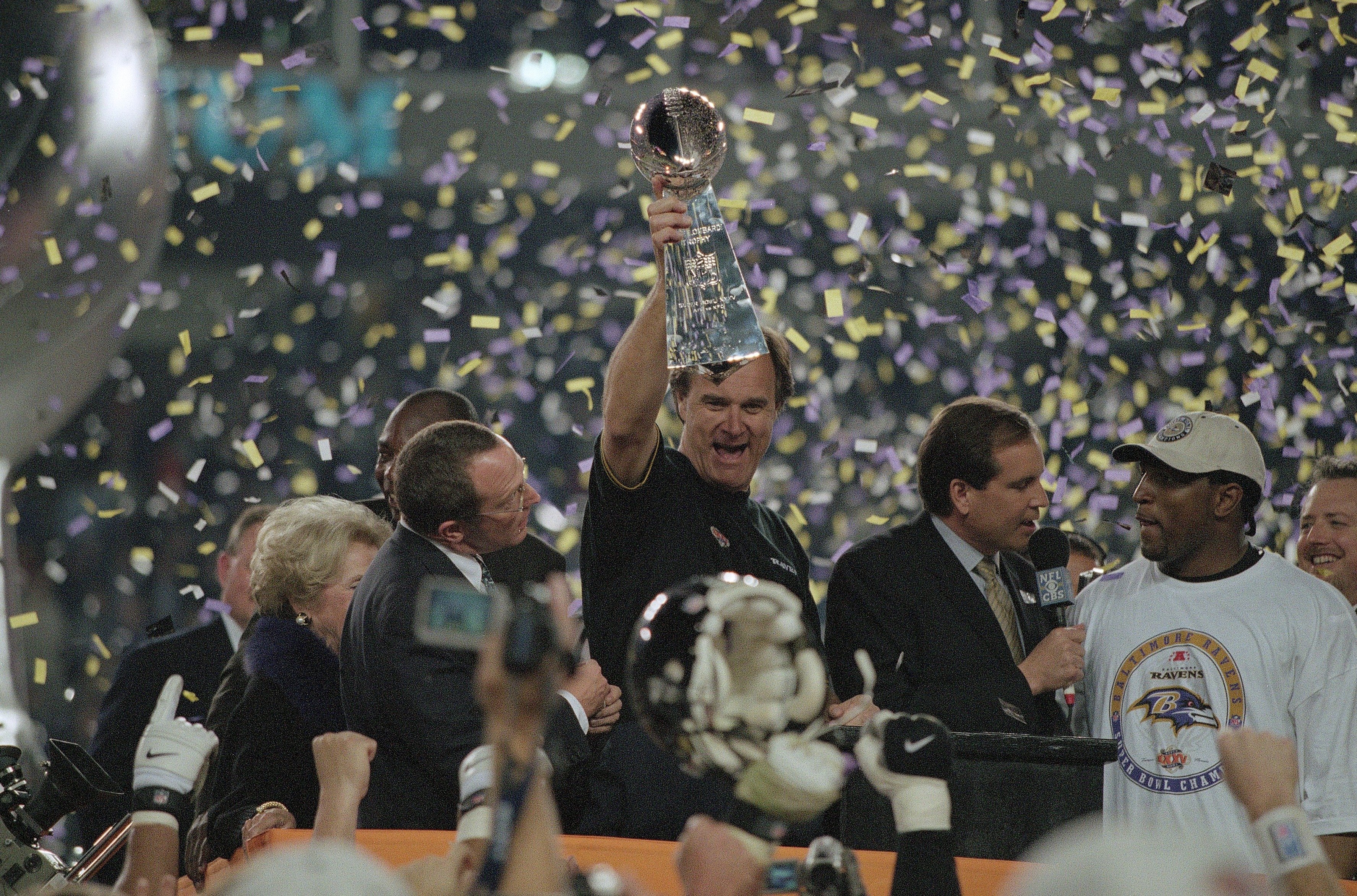 UNITED STATES - JANUARY 28: Football: Super Bowl XXXV, Baltimore Ravens coach Brian Billick victorious with Lombardi trophy after game vs New York Giants, Tampa, FL 1/28/2001 (Photo by Bob Rosato/Sports Illustrated/Getty Images) (SetNumber: X62359 TK4 R9 F32)