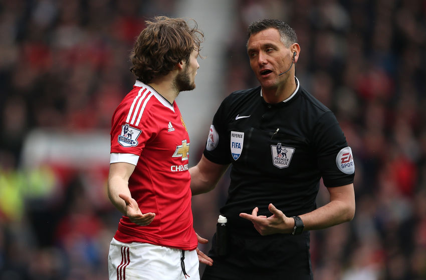 MANCHESTER, ENGLAND - APRIL 03: Daley Blind of Manchester United and Referee Andre Marriner exchange words during the Barclays Premier League match between Manchester United and Everton at Old Trafford on April 3, 2016 in Manchester, England. (Photo by Matthew Ashton - AMA/Getty Images)