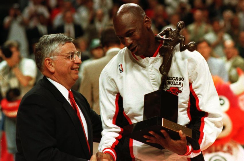 21 May 1996: Guard Michael Jordan of the Chicago Bulls shakes hands with NBA Commissioner David Stern as he is presented with the 1996 NBA Most Valuable Player award prior to the start of game two in the NBA Eastern Conference Finals against the Orlando