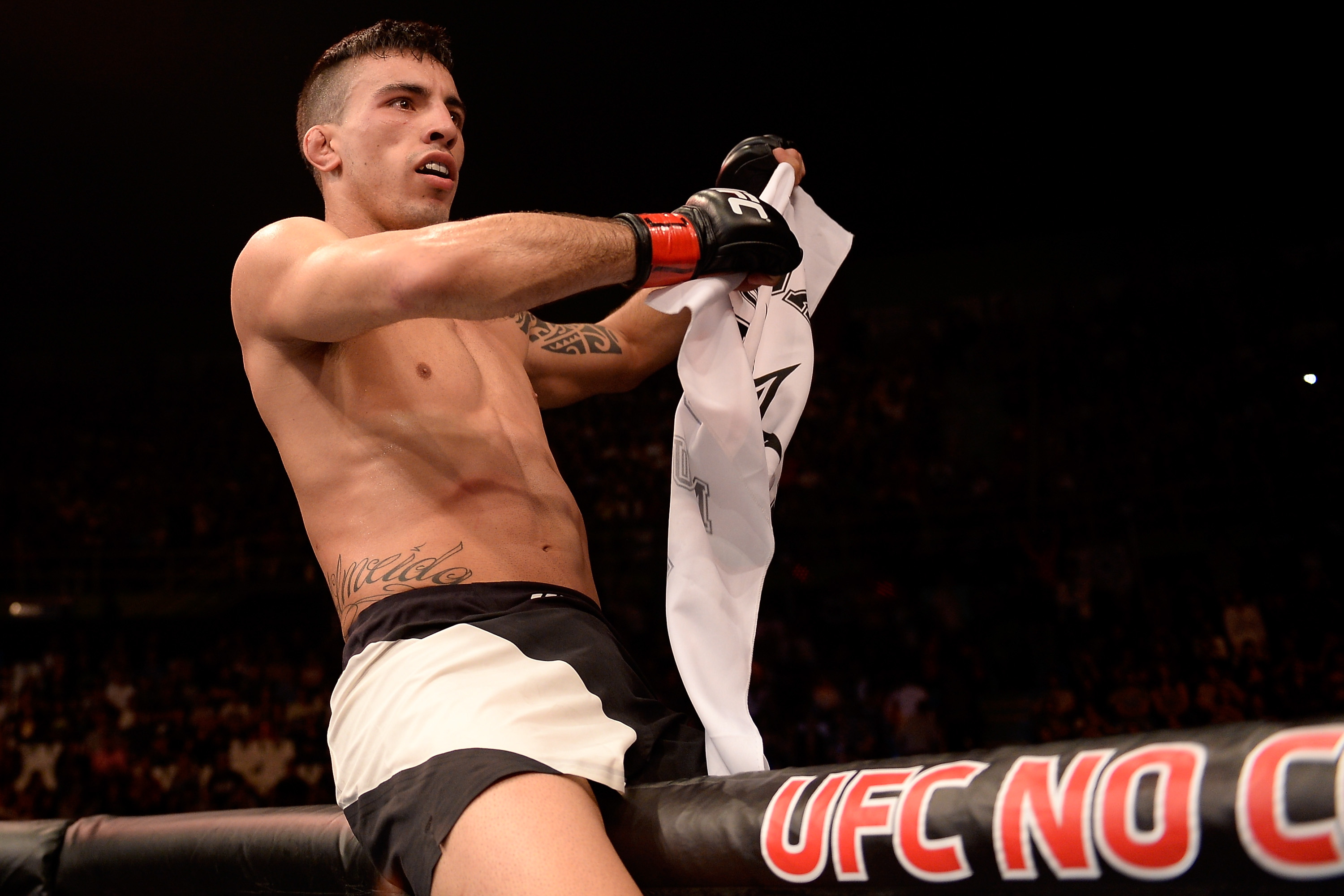 SAO PAULO, BRAZIL - NOVEMBER 07: Thomas Almeida of Brazil celebrates victory over Anthony Birchak of the United States in their bantamweight bout during the UFC Fight Night Belfort v Henderson at Ibirapuera Gymnasium on November 7, 2015 in Sao Paulo, Brazil. (Photo by Buda Mendes/Zuffa LLC/Zuffa LLC via Getty Images)