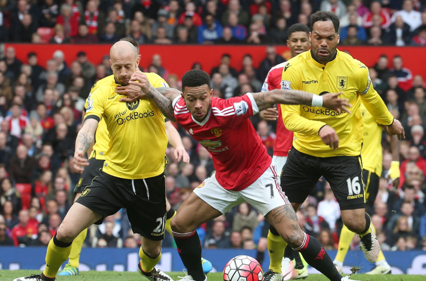 MANCHESTER, ENGLAND - APRIL 16: Memphis Depay of Manchester United in action with Alan Hutton and Joleon Lescott of Aston Villa during the Barclays Premier League match between Manchester United and Aston Villa at Old Trafford on April 16, 2016 in Manchester, United Kingdom. (Photo by Matthew Peters/Man Utd via Getty Images)
